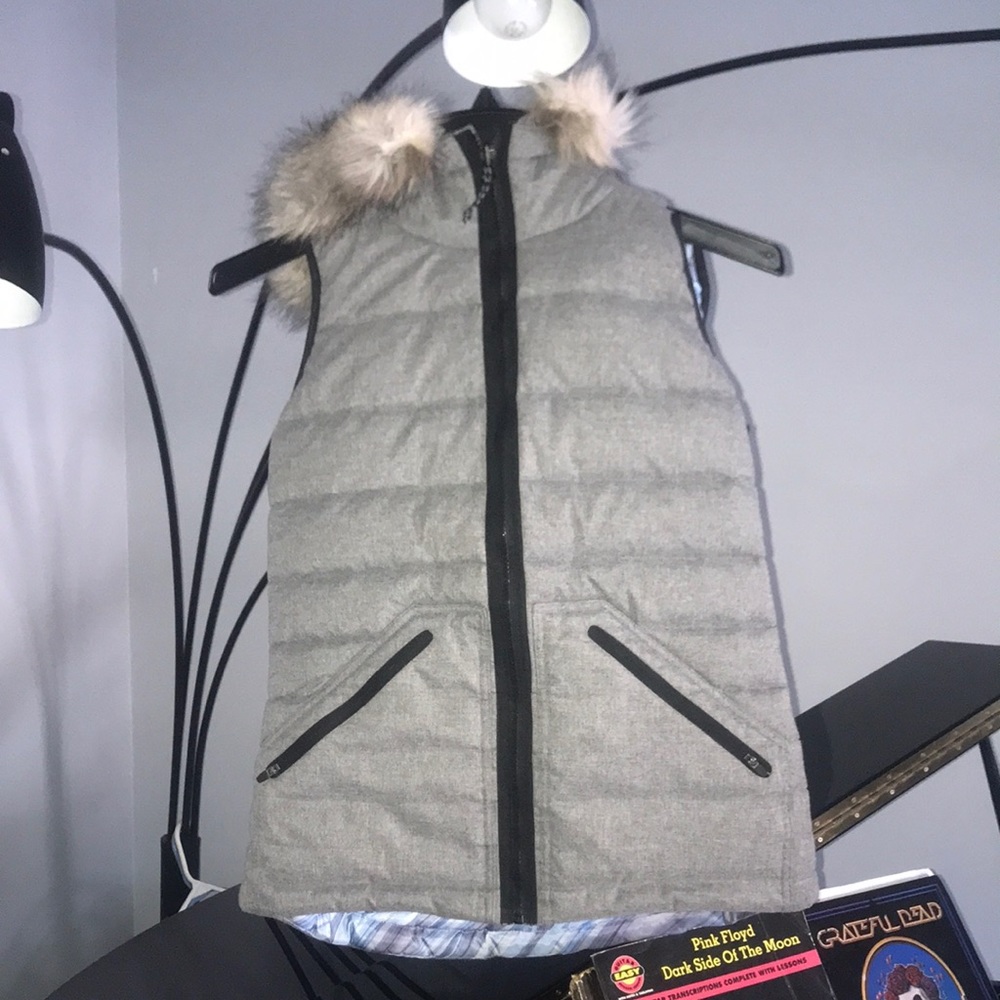 Womens puffy vest with fur hood
